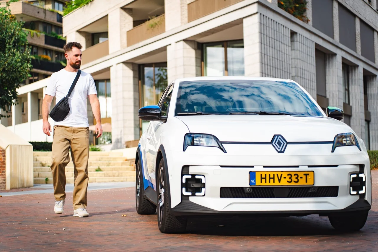 Man walking towards his shared car
